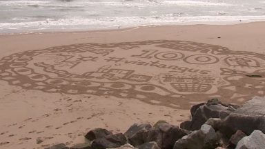 Beach artwork celebrates launch of Angus guidebook