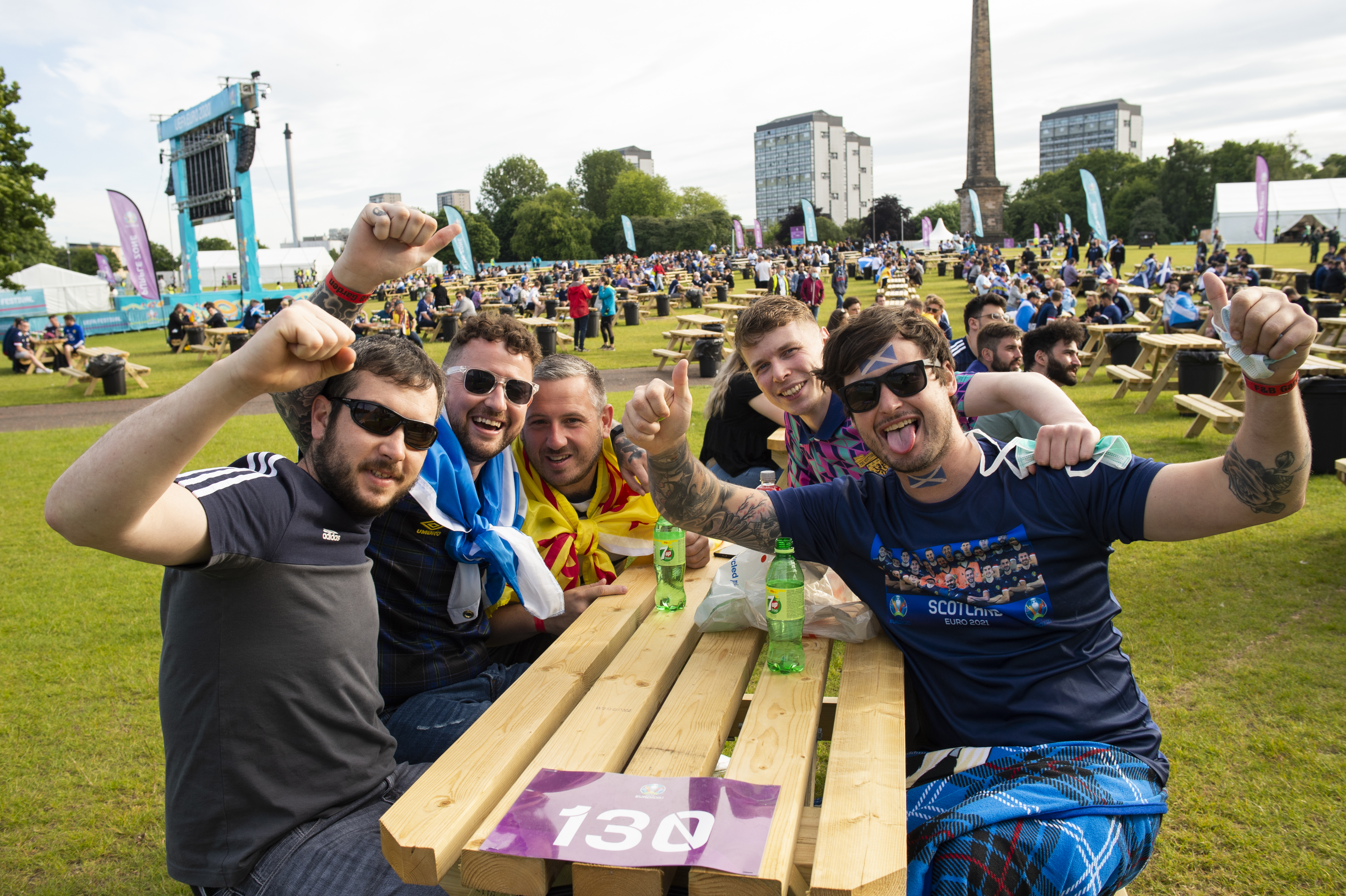 Scotland supporters gather at the fan zone in Glasgow Green.