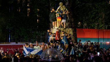 Tartan Army fans celebrate Scotland’s 0-0 draw with England