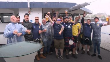 Scotland fans warm up their vocal cords in time for the game