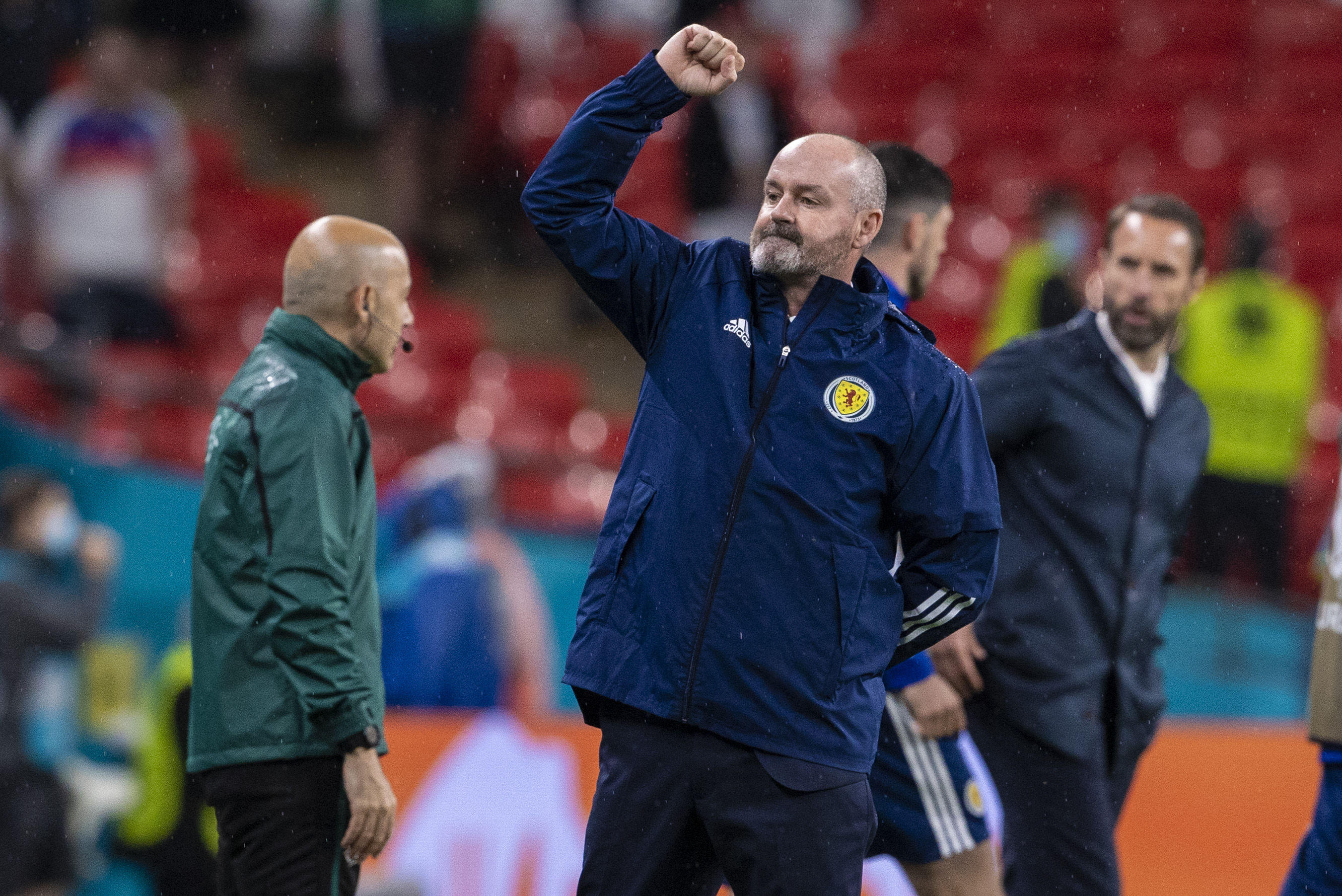 Steve Clarke salutes the Tartan Army at full-time.