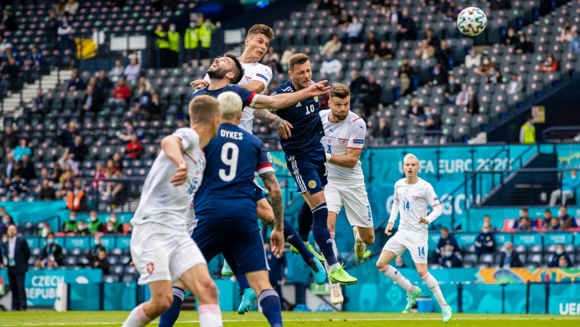 Patrik Schick rises above Grant Hanley to put the Czech Republic in the lead.