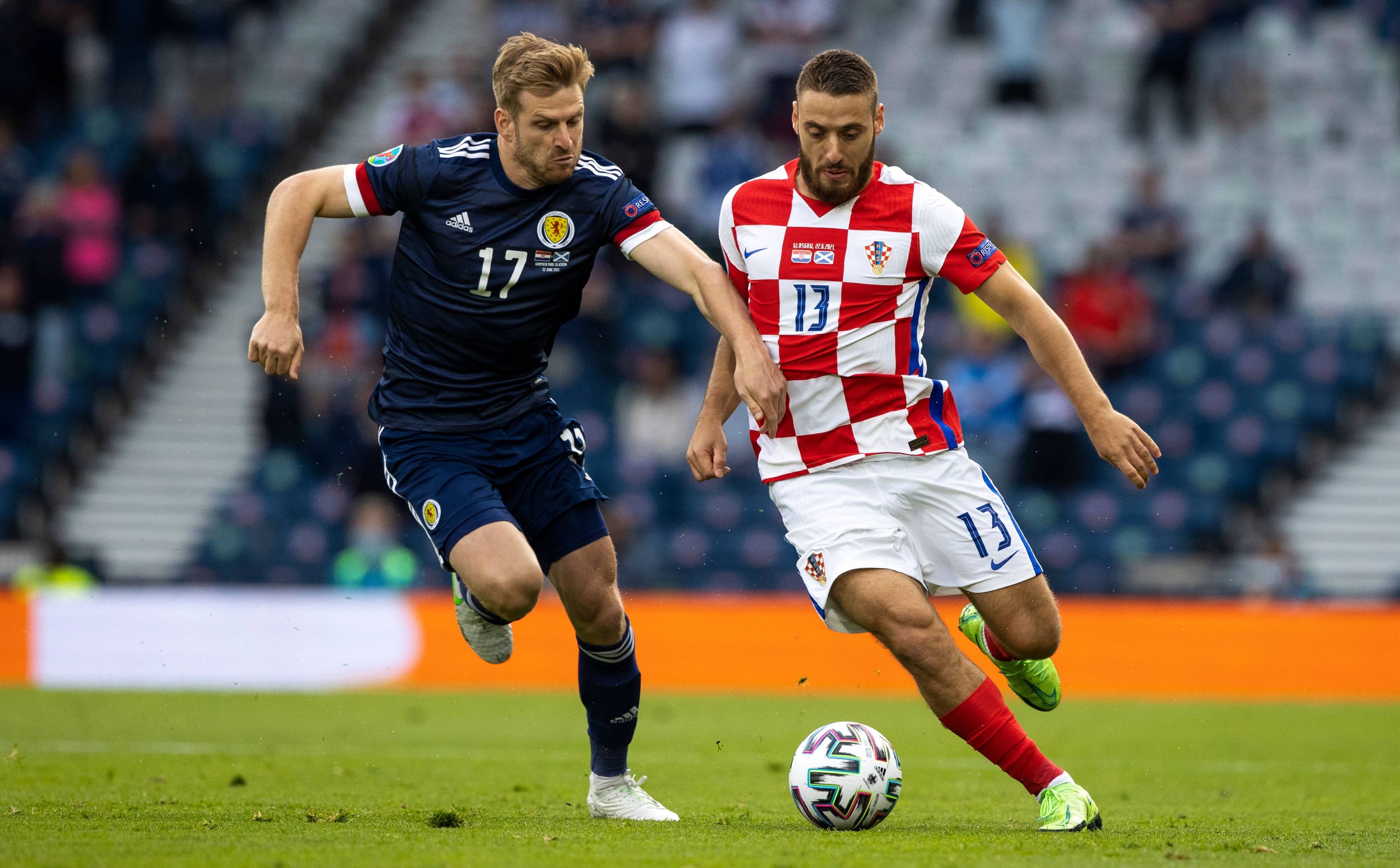 Stuart Armstrong gives chase.