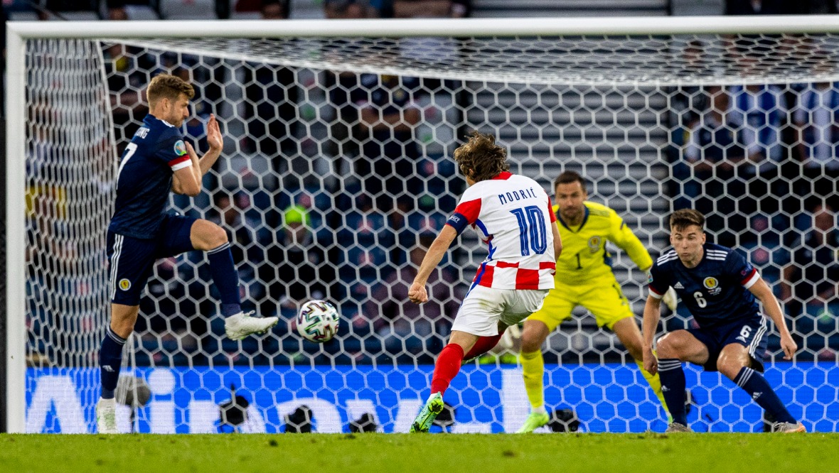 GLASGOW, SCOTLAND - JUNE 22: Luka Modric scores to make it 2-1 Croatia during a Euro 2020 match between Croatia and Scotland at Hampden Park, on June 22, 2021, in Glasgow, Scotland. (Photo by Craig Williamson / SNS Group) 