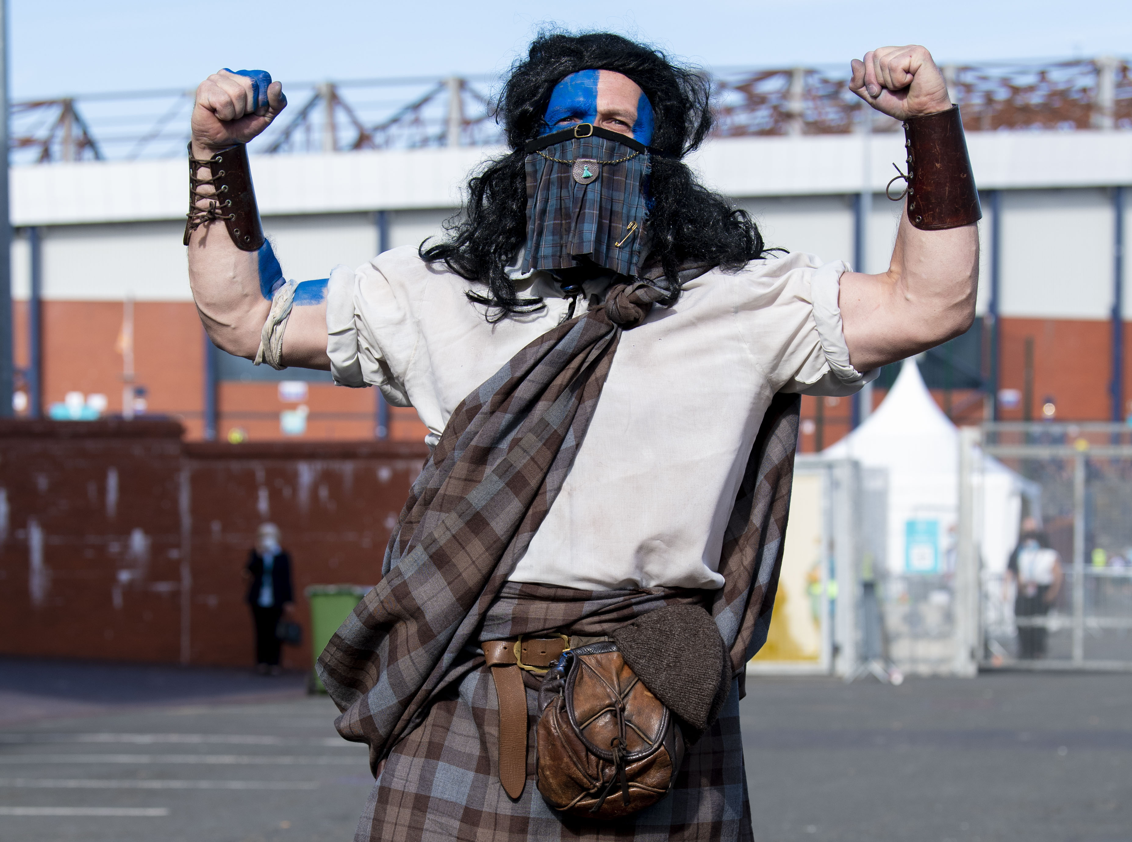 Braveheart: Fan dressed up for the big game.