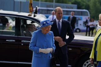 Prince William enjoys Irn-Bru during Queen’s factory visit