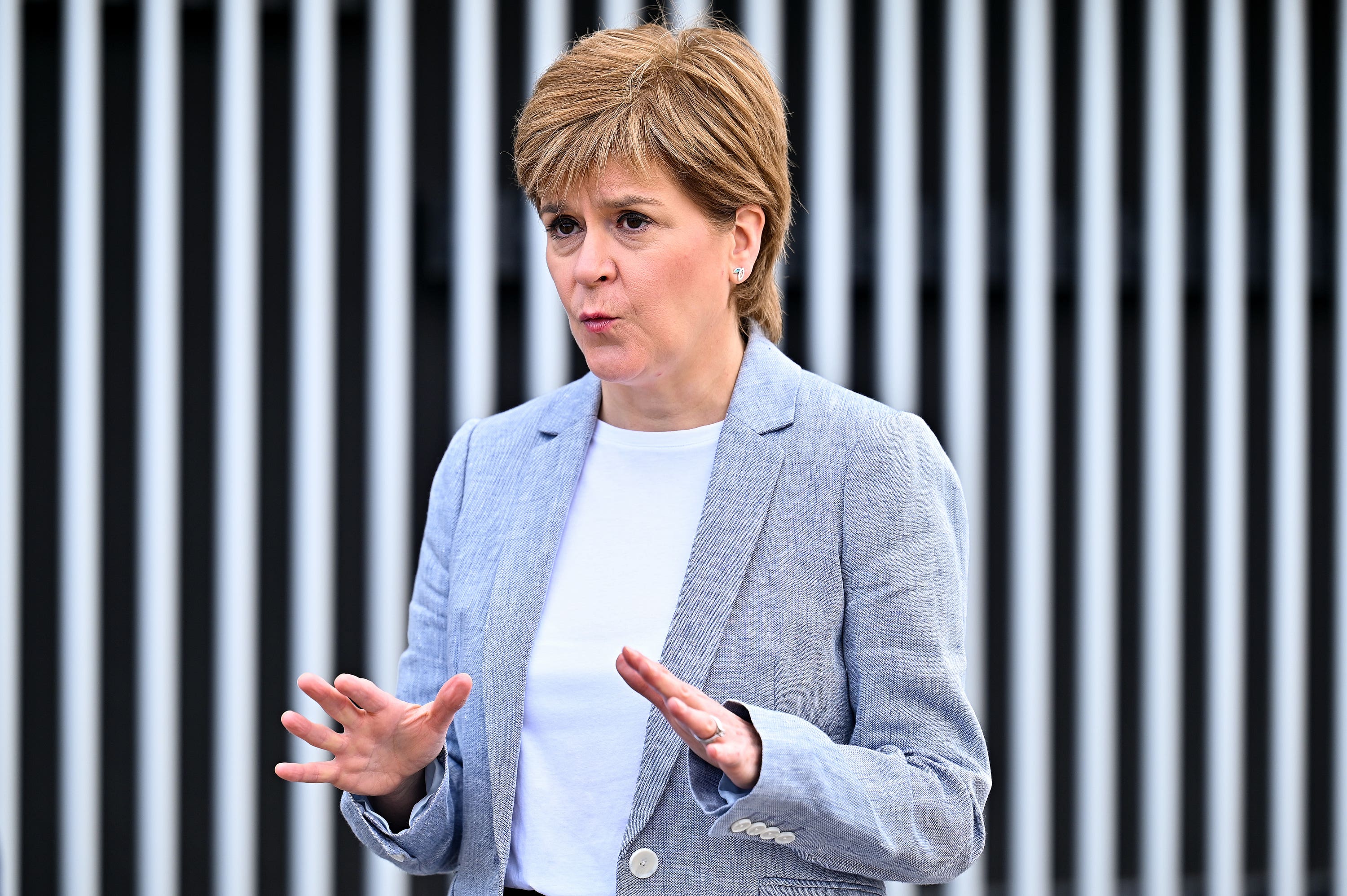 Nicola Sturgeon announced a ban on all non-essential travel to Manchester and Salford (Jeff J Mitchell/PA)