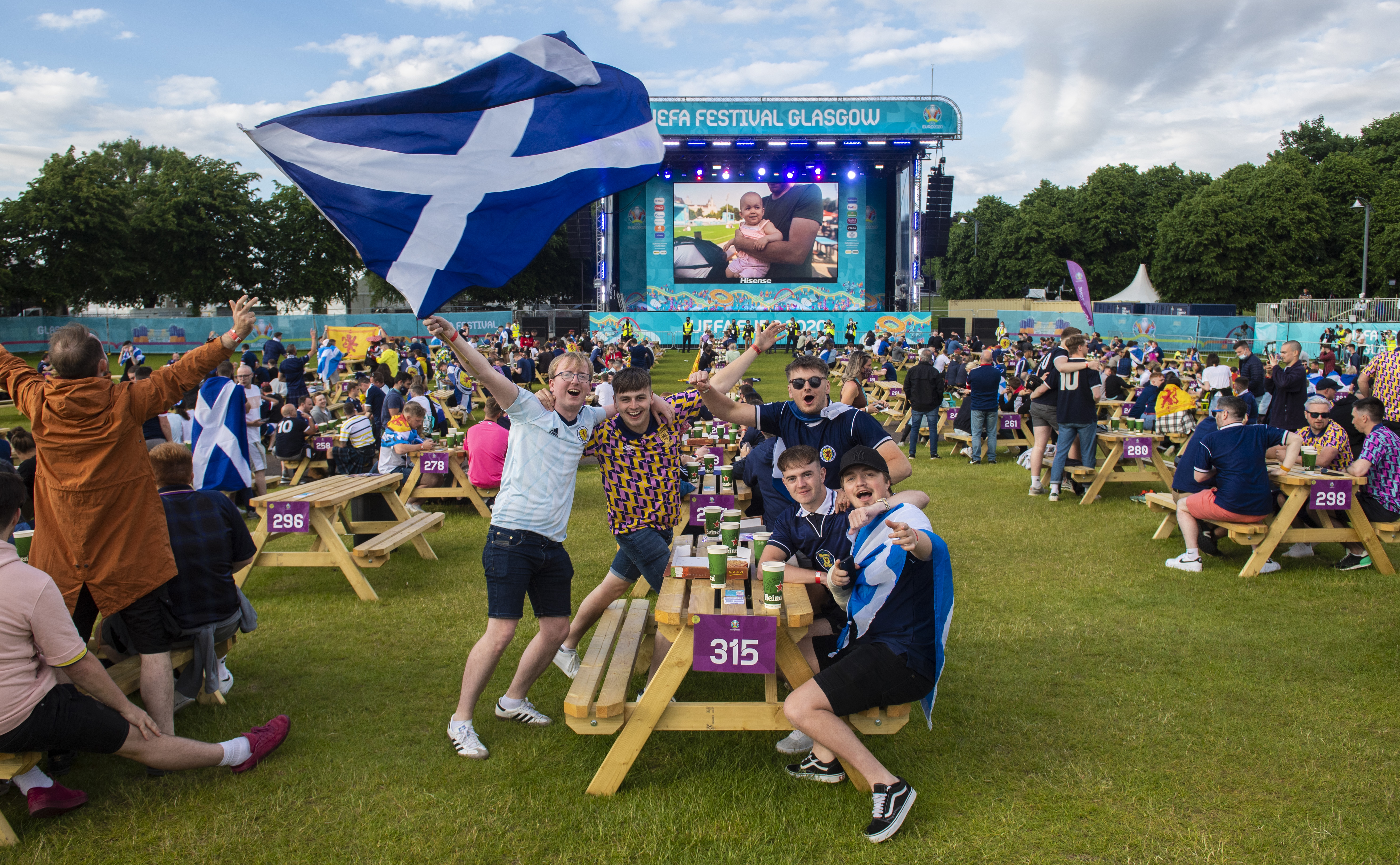 Home support: Fans gathering in Glasgow Green's fan zone.