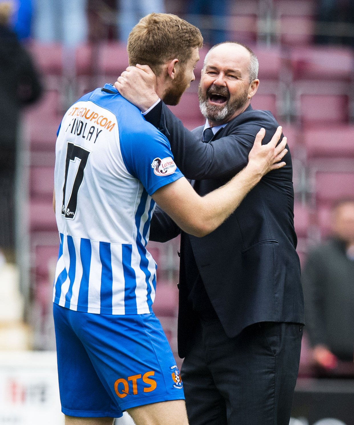 Stuart Findlay earns a rare hug from Steve Clarke after his goal at Tynecastle.