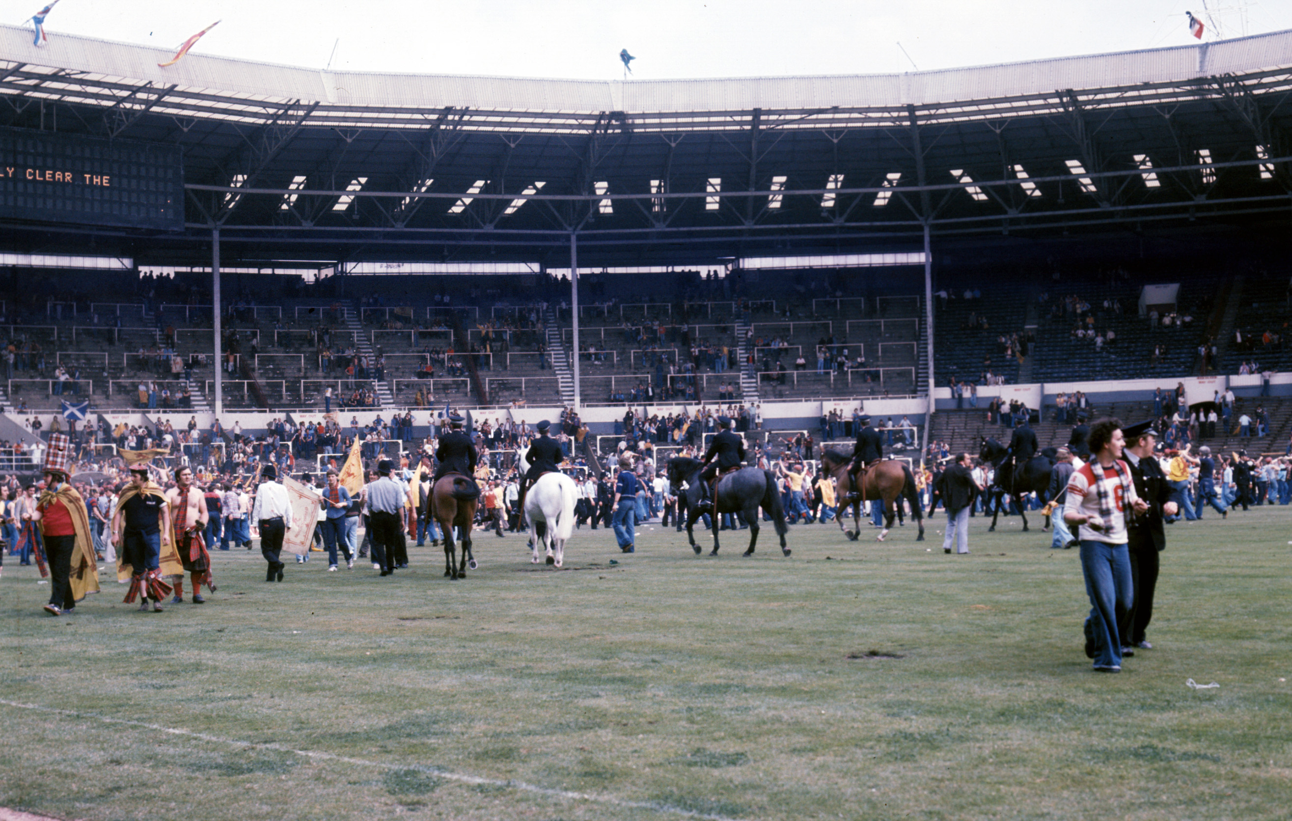 Scotland fans invade the Wembley pitch after the 1977 game.