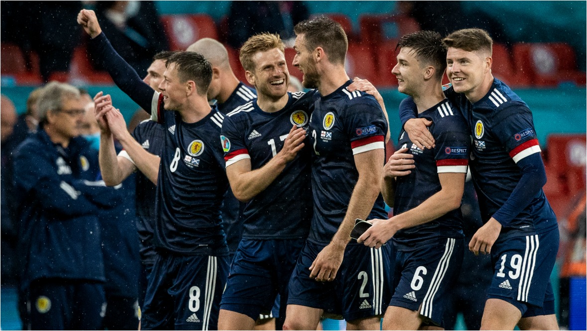 Scotland players celebrate their point at full-time.