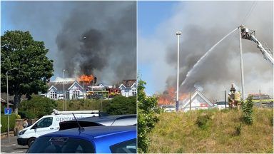 Trains cancelled as firefighters tackle Troon station blaze
