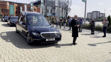 Celtic fans applaud Charlie Gallagher after legend’s funeral