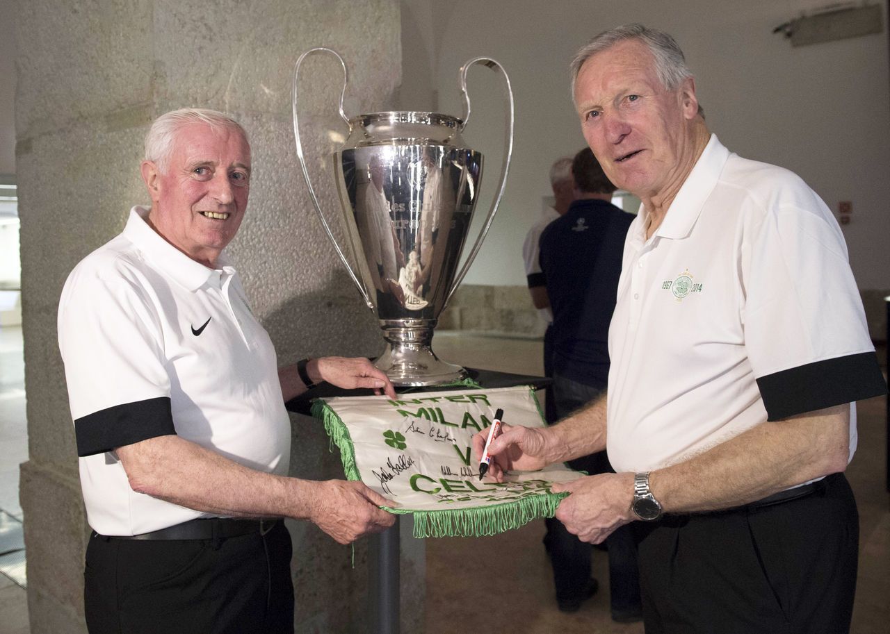 Celtic legends Charlie Gallagher and Billy McNeill visit a Champions League gallery in Lisbon.