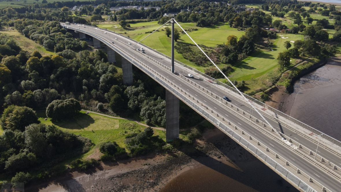 Person taken to hospital after crash which overturned car and closed Erskine Bridge