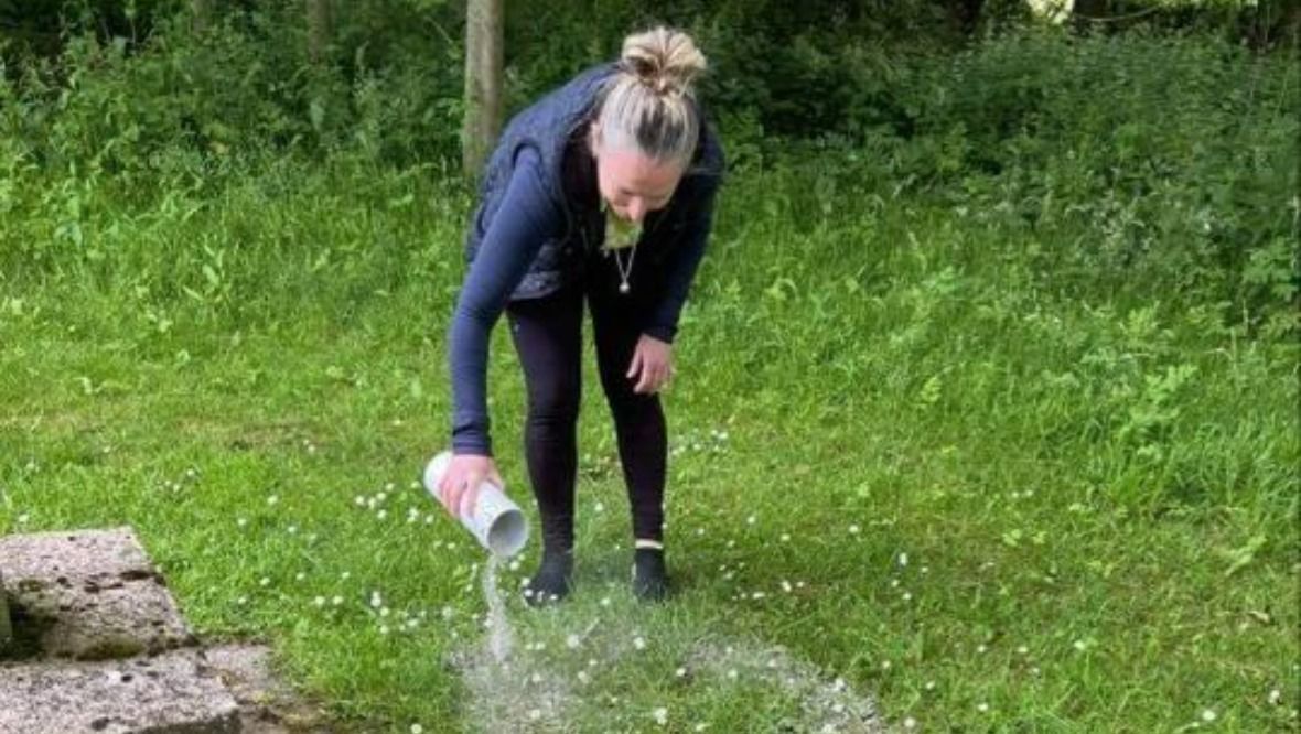 Donna Morrison spreads his brother's ashes at the rehab centre.