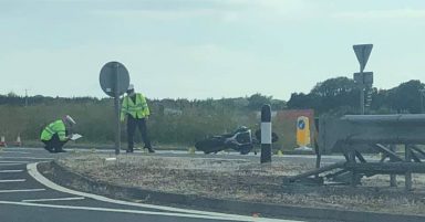 A90 closed after van and motorbike crash with two in hospital