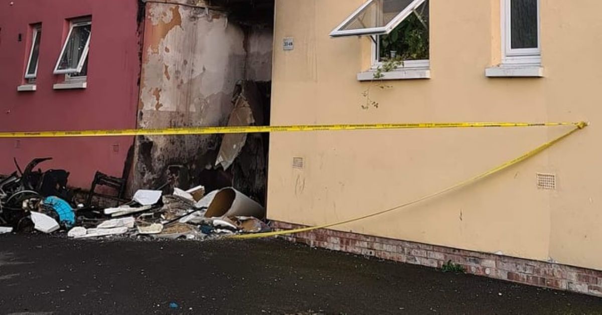 Homes damaged after pile of furniture set on fire outside flats