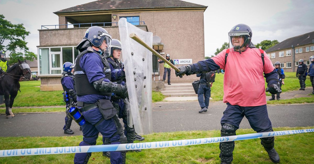 Police Scotland officers take part in a role-play exercise recreating a protest during a COP26 public order training at Craigiehall Army barracks, South Queensferry, ahead of the COP26 summit in Glasgow.