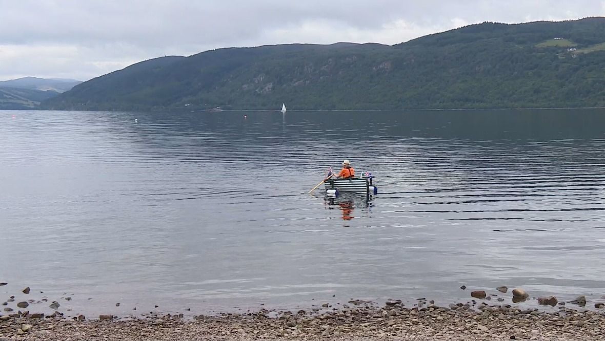 At ease: Major Stanley rowing on Loch Ness.