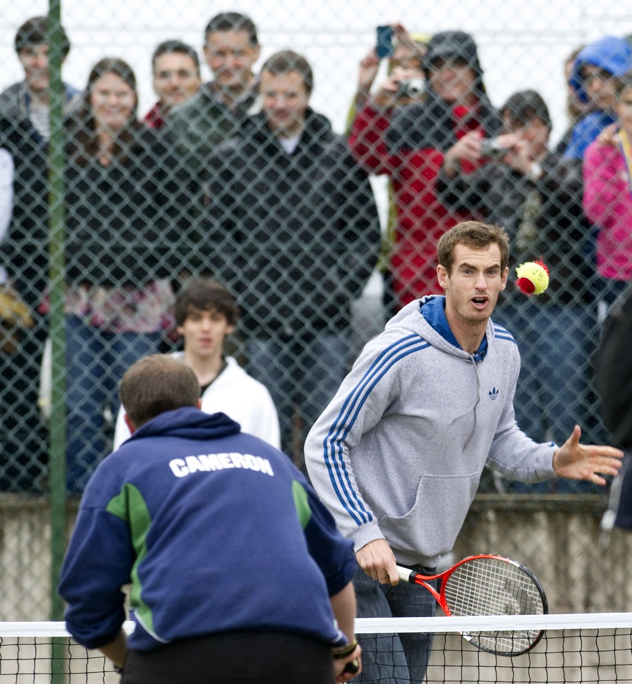 Murray took time out for a hit with some local youngsters.