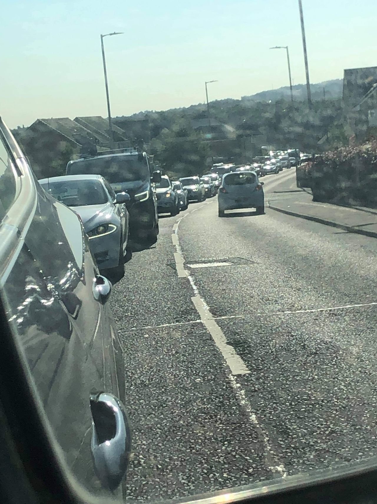 The queue for Newton Farm Primary School test site.