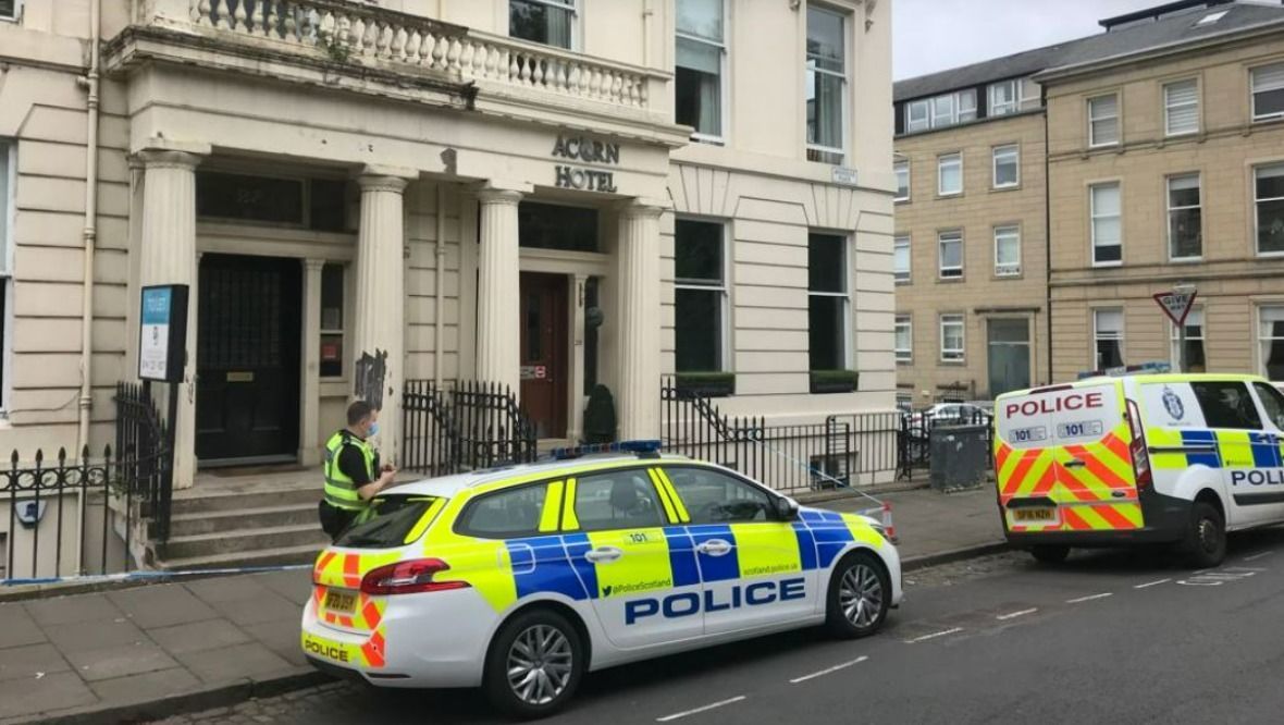 Three arrested after man found seriously injured at hotel