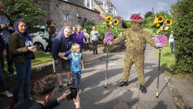 ‘Hip hip hooray’: Town continues Burryman’s Day tradition