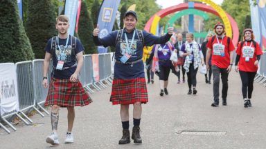 Thousands hit the streets for first Kiltwalk in two years