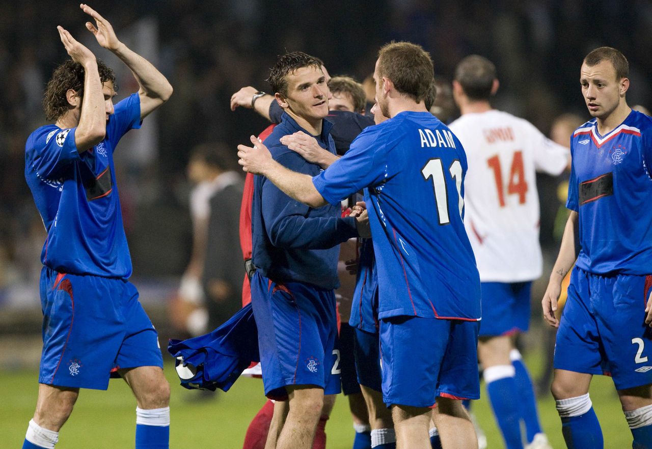 Lee McCulloch celebrates the win with Charlie Adam.