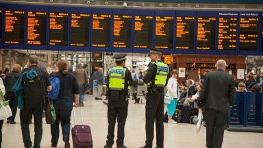 Hunt for teenagers after man attacked on train from Glasgow Central