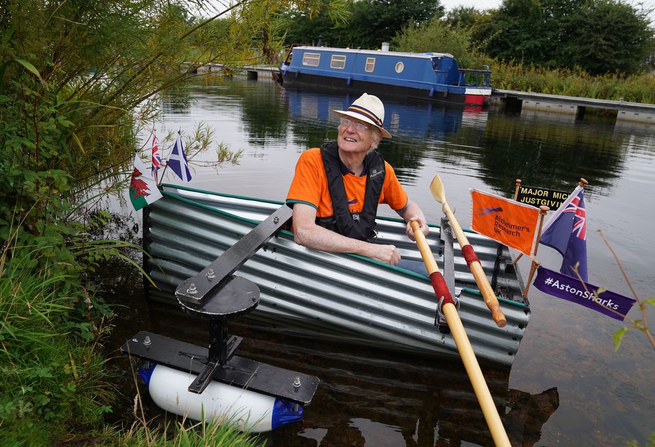 The retired Army major is rowing 100 miles across the country for charity in his home-made tin boat. (PA Media)