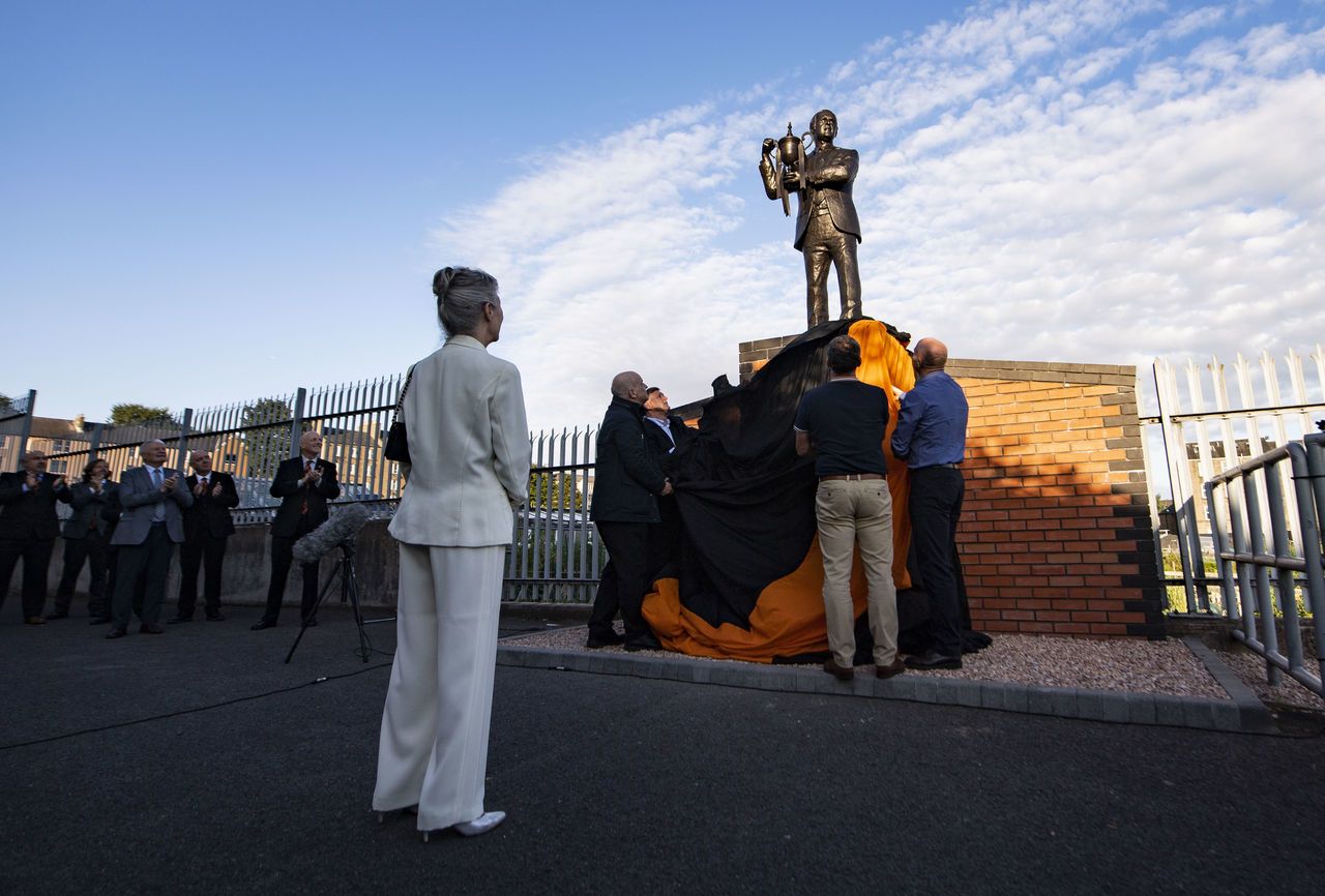 DUNDEE, SCOTLAND - SEPTEMBER 18: Doris McLean looks on as a statue of her late husband, legendary Dundee United manager Jim McLean, is unveiled outside of Tannadice Stadium on September 18, 2021, in Dundee, Scotland.
