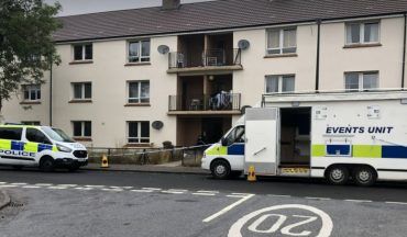 Man due to appear in court over death in flat