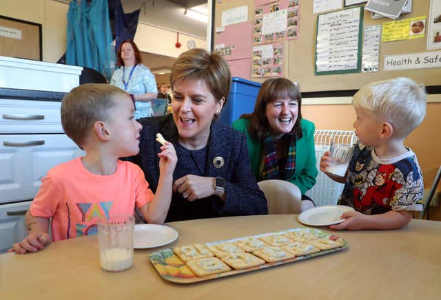 Public health minister Maree Todd (third from left) with Nicola Sturgeon (Andrew Milligan/PA)<br>” /><span class=