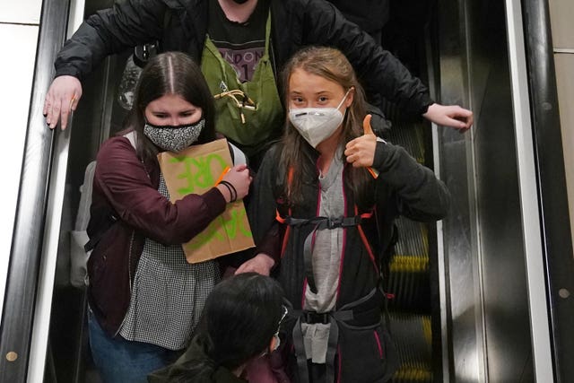 <em>Climate activist Greta Thunberg arrives at Glasgow Central train station</em>” /><cite class=