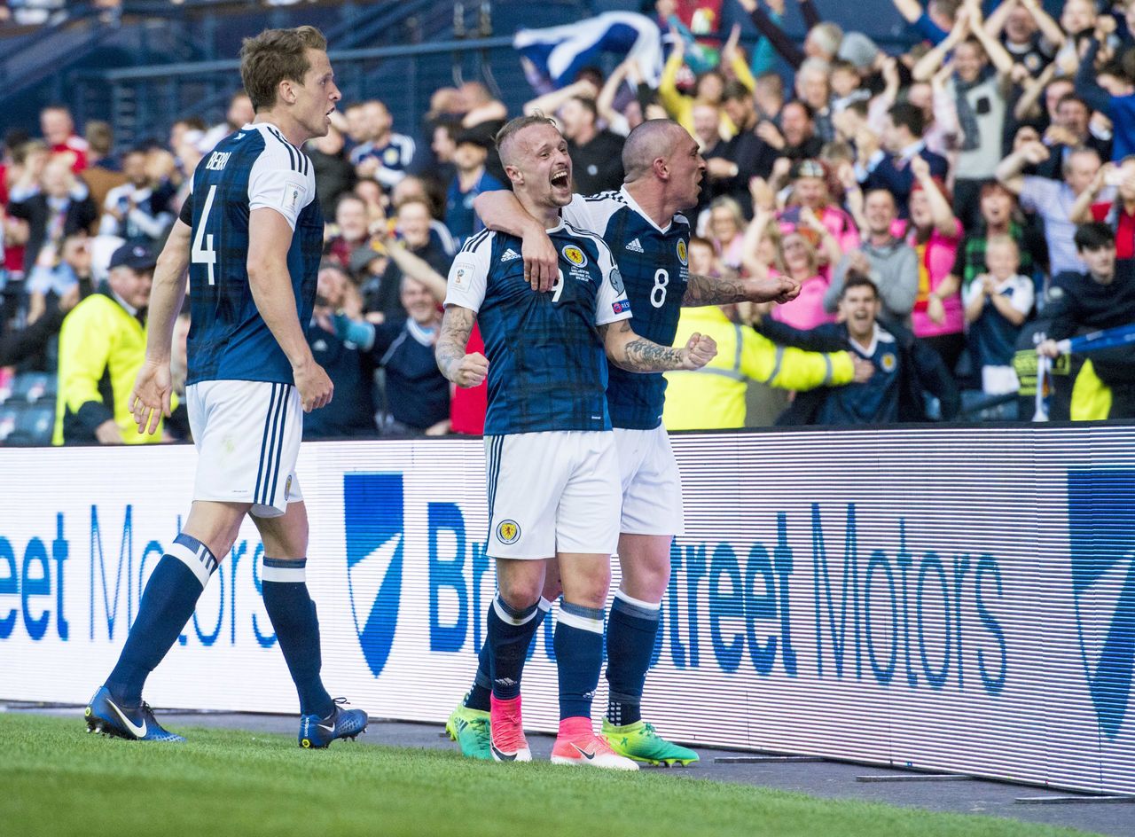 One of the most memorable moments in a generation at Hampden as Leigh Griffiths celebrates his second free-kick goal in a matter of minutes against England. Scotland led 2-1 going into injury-time but fell short again when Harry Kane levelled at the death. 