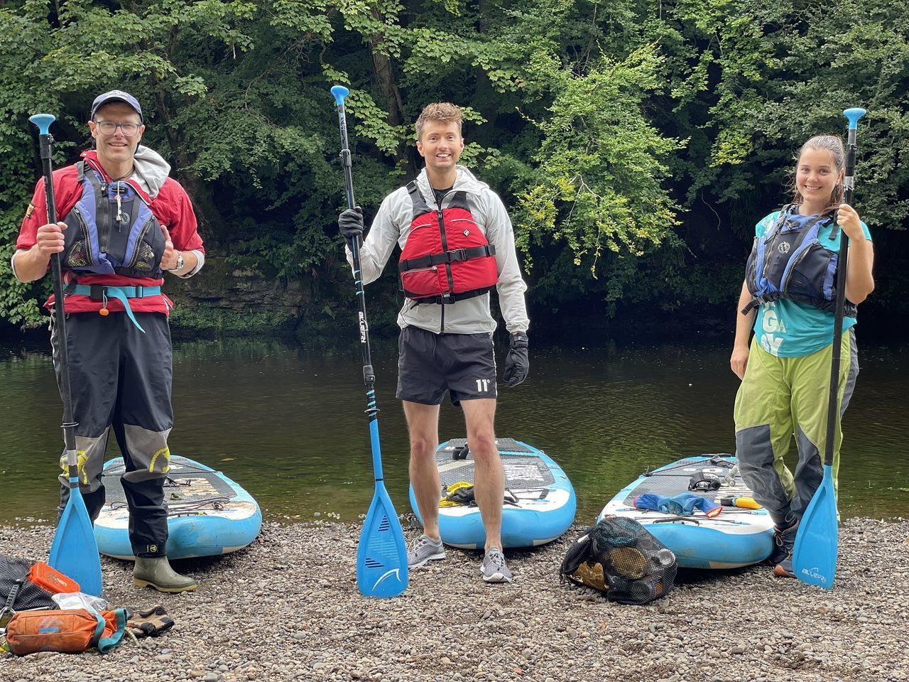 Sean Batty with paddle boarders Charlotte and Neil.