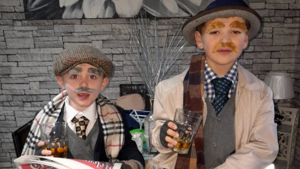 Still Game Pals dress up as Jack and Victor with apple juice pints