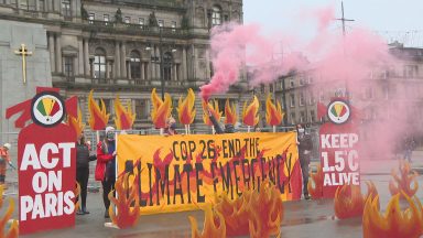 Young climate activists display ‘fiery’ protest in George Square