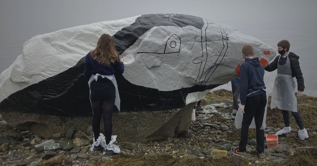 The rock was transformed by the school art students with some help from locals.