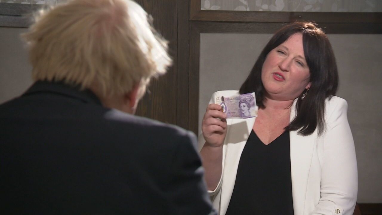  STV News' Kathryn Samson challenged Boris Johnson over the £20 cut to Universal Credit. (STV News)
