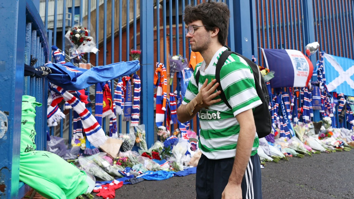 Old Firm: A Celtic fan paid tribute to Smith outside Ibrox.