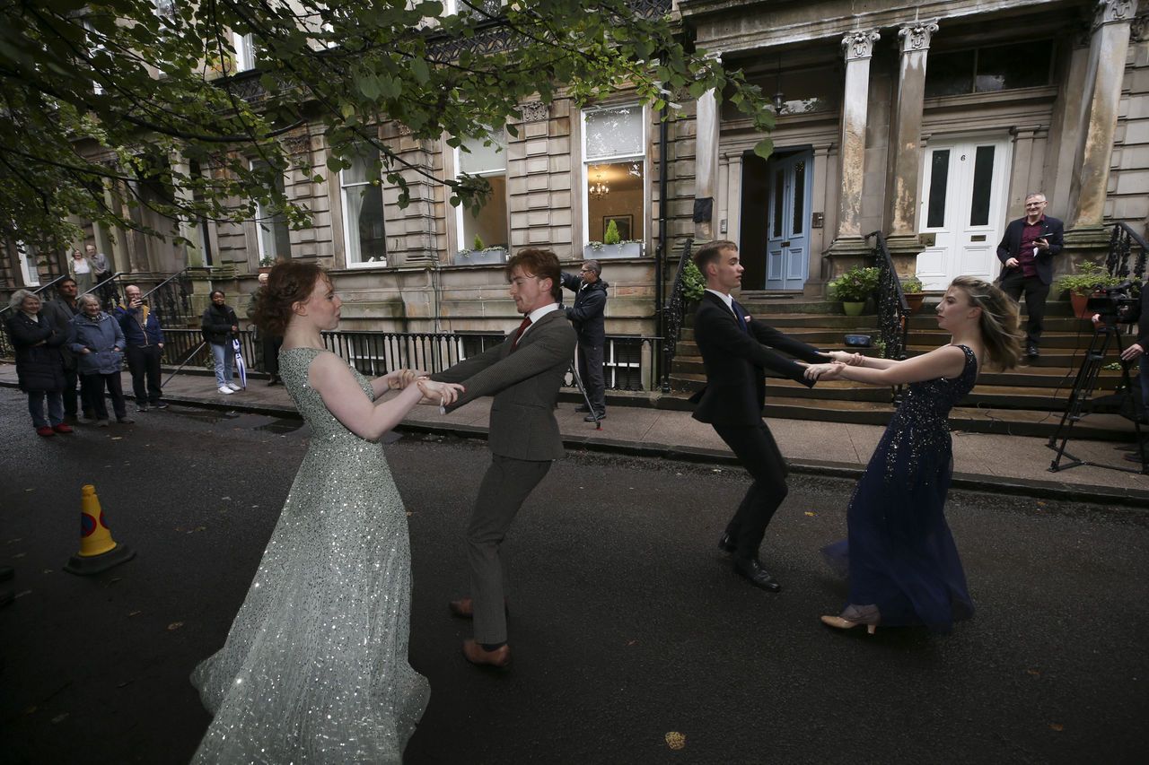 Dancers from Glasgow Clyde College marked the 100th anniversary of Deborah Kerr in Glasgow's Ruskin Terrace. (SWNS)