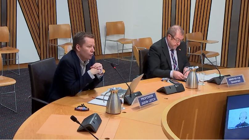 Jason Leitch (left) appeared alongside transport minister Graeme Dey (right). (Scottish Parliament TV) 