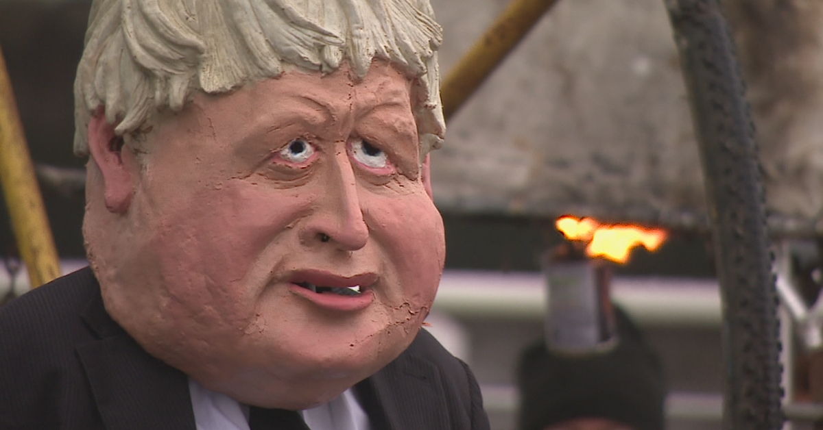 Sophie Miller as Boris Johnson at the Ocean Rebellion protest next to the River Clyde.