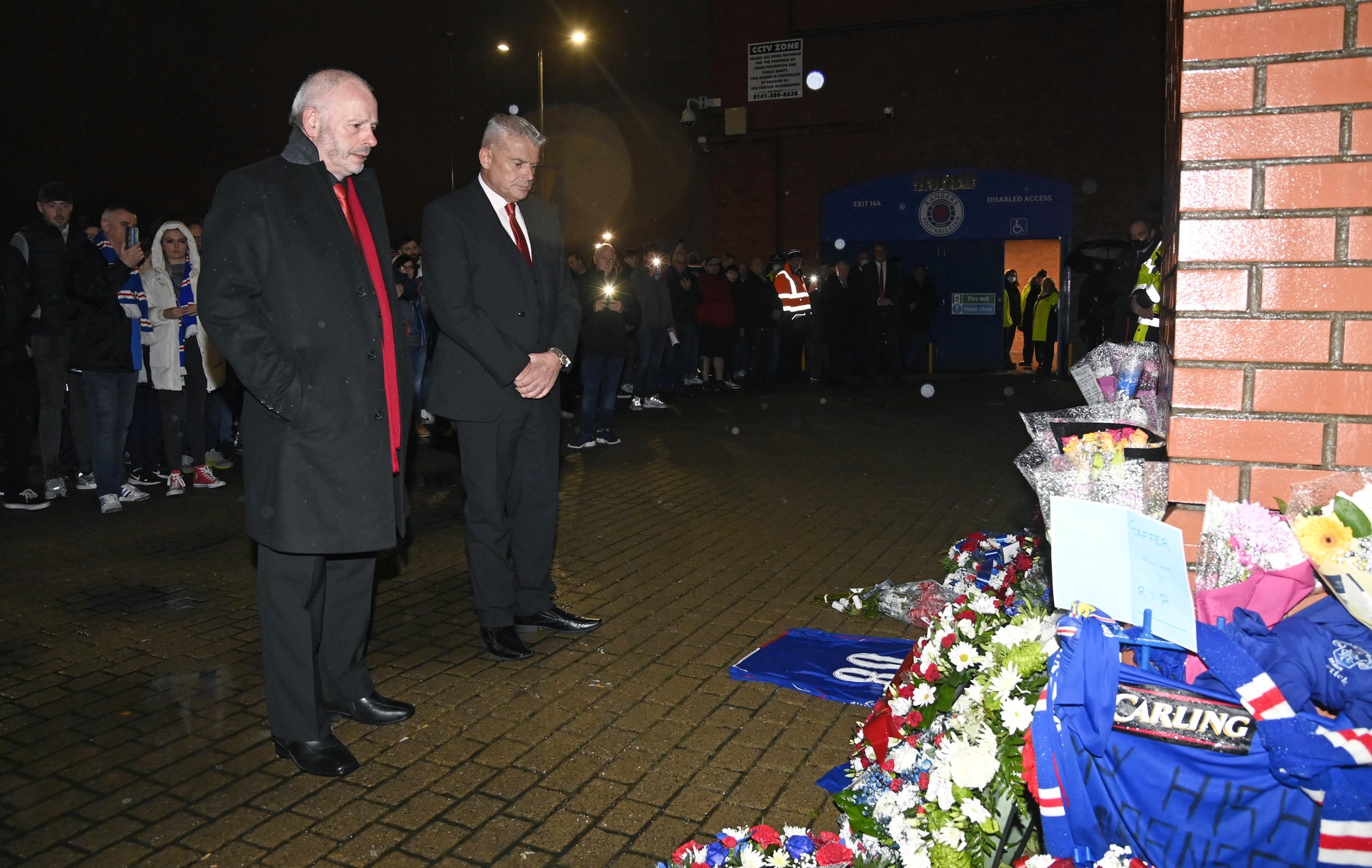 GLASGOW, SCOTLAND - OCTOBER 27: Aberdeen's former chairman Stewart Milne and chairman Dave Cormack (right) lay a wreath in tribute to Rangers legend Walter Smith who passed away aged 73   during a Cinch Premiership match between Rangers and Aberdeen at Ibrox stadium, on October 26, 2021, in Glasgow, Scotland. (Photo by Rob Casey / SNS Group)