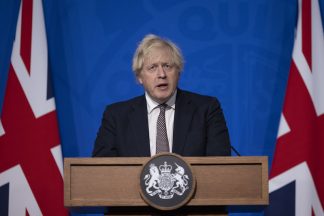 Boris Johnson pledges to ‘throw everything’ at Covid booster efforts