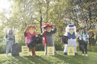 The Wombles help tidy up park as part of litter-picking project