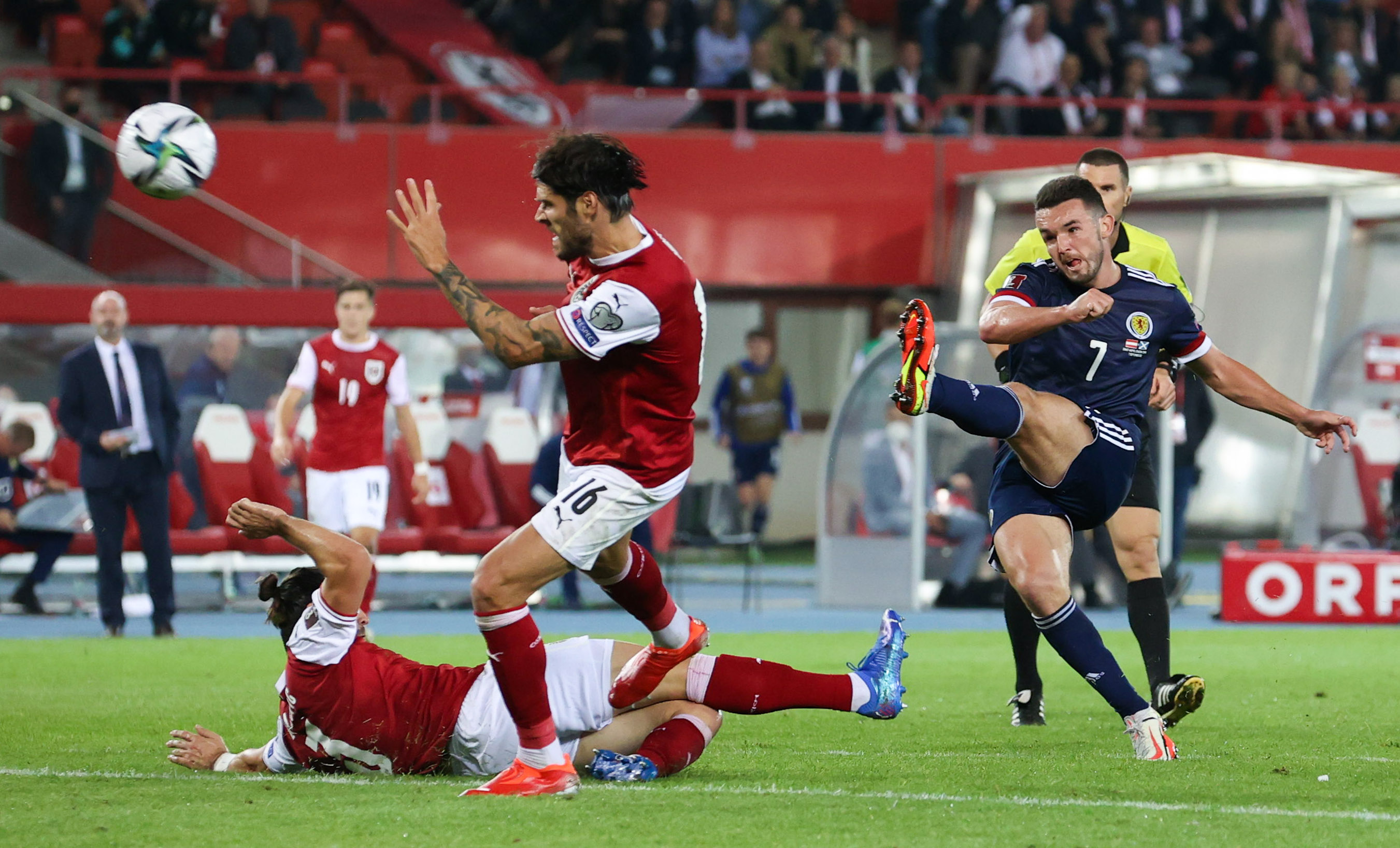 John McGinn has a shot during Scotland's visit to Austria in the qualifying group.